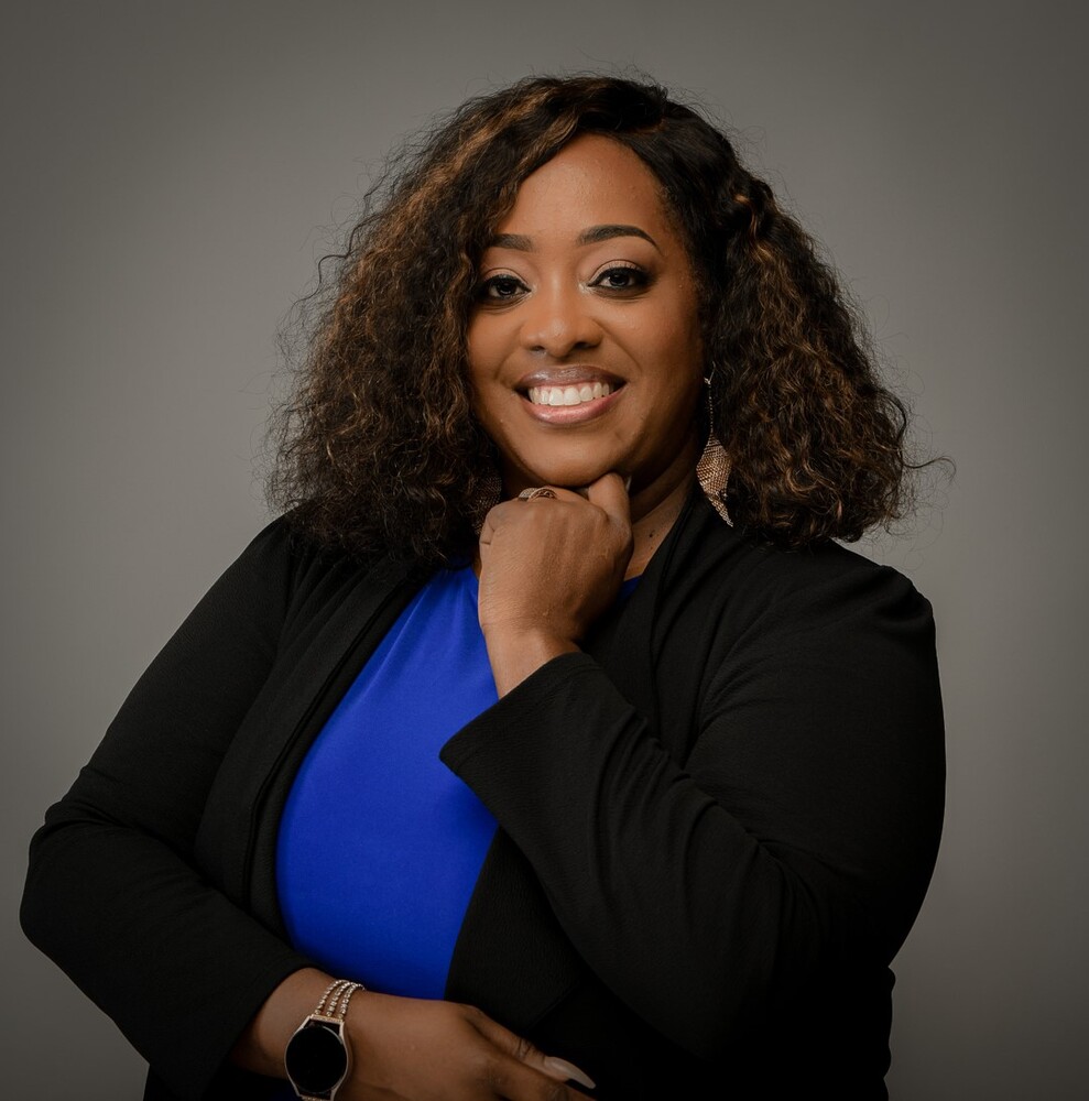 Kimberly Levingston posing for a professional business photograph